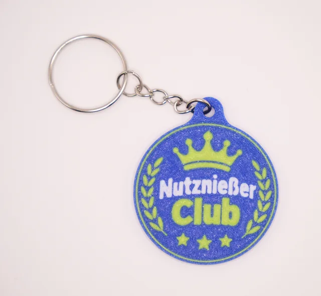 Nutznießer Club Schlüsselanhänger – 3-farbig