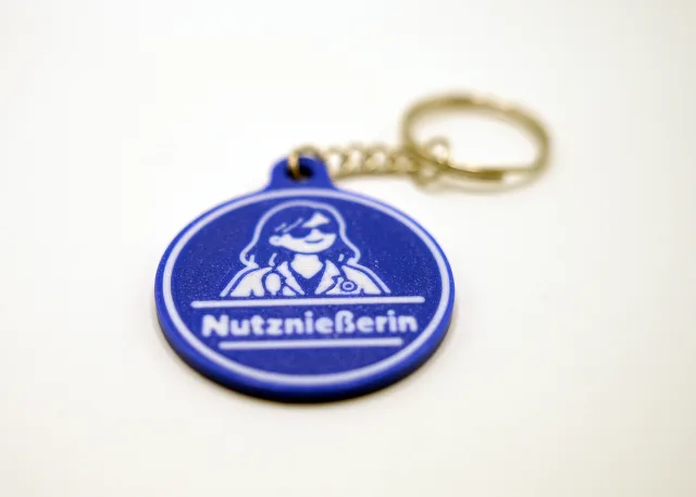 Nutznießerin Schlüsselanhänger – rund